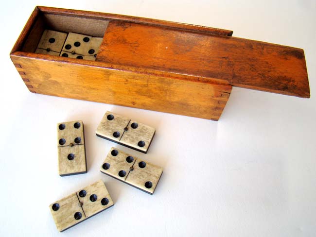 A nice boxed set of Civil War era bone and ebony Dominoes circa 1865